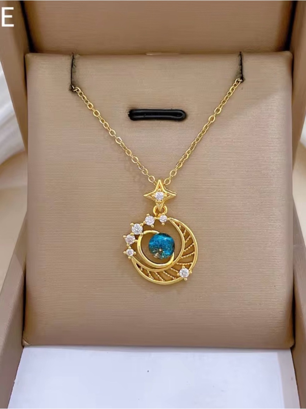 Gold-Tone Star & Moon Pendant Necklace with Blue Accent